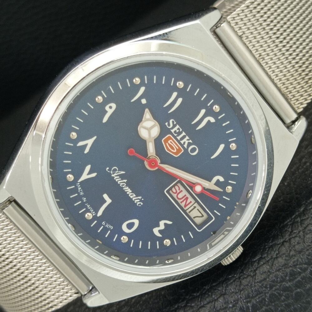 Vintage 1975 Seiko Automatic Mens Silver Watch W/daydate & Red accents
